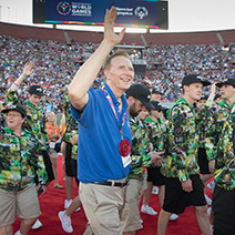 Edward M. Ellison, MD, executive medical director, Southern California Permanente Medical Group, walks alongside the Special Olympics athletes from Australia in the Parade of Athletes.